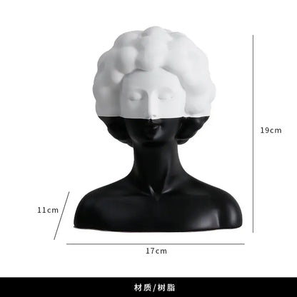 Black and white abstract portrait resin figure with glossy finish featuring textured white curls and smooth black face decorbites abstract portrait