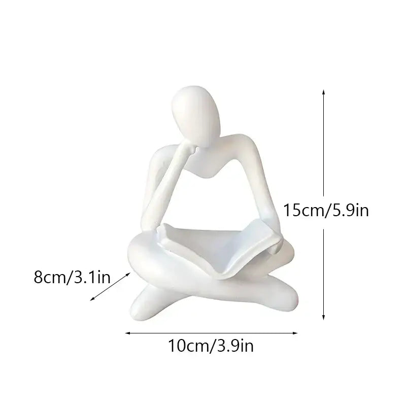 White ceramic abstract resin book figurine of seated thinker holding open book for black and white office decorbites decor