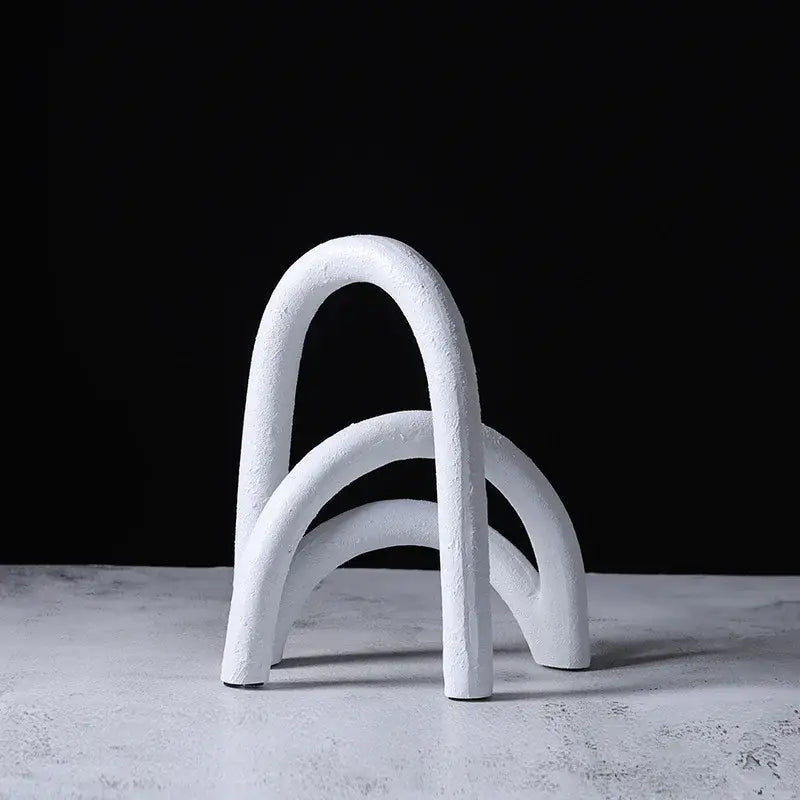 White textured ceramic sculpture with three overlapping curved arches for decorbites abstract resin geometry bookends
