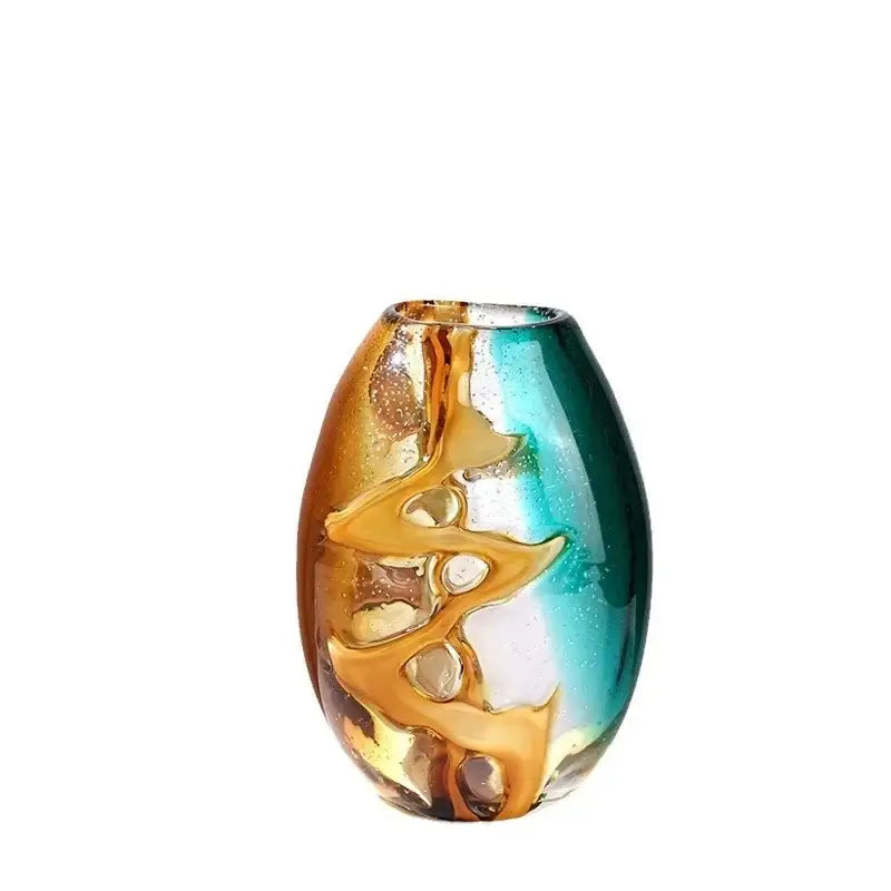 A vibrant hand-blown abstract ripple glass vase with amber teal hues and gold leaf patterns for living room decor