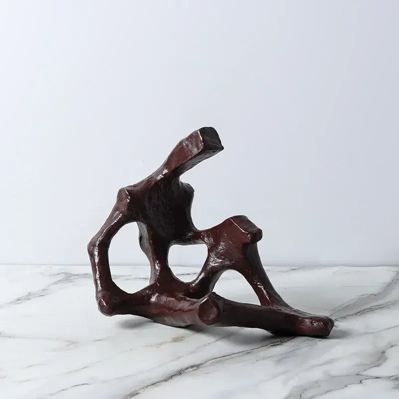 Dark brown glossy abstract skeleton decor sculpture with organic branching forms for living room bookends