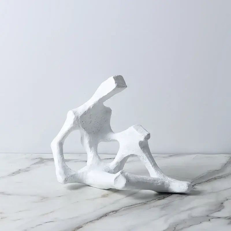 White abstract skeleton decor figure sculpture with angular geometric forms and textured surface for living room bookends