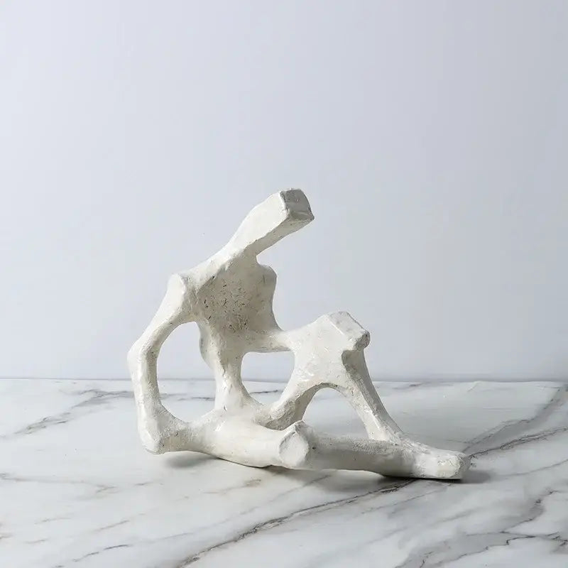 White textured ceramic abstract skeleton decor figure sculpture with organic form for living room bookends