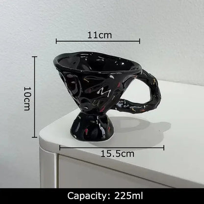 Black ceramic mug with textured sculpted surface and subtle pink accents decorative ceramic mug for dining room decorbites colorful icing