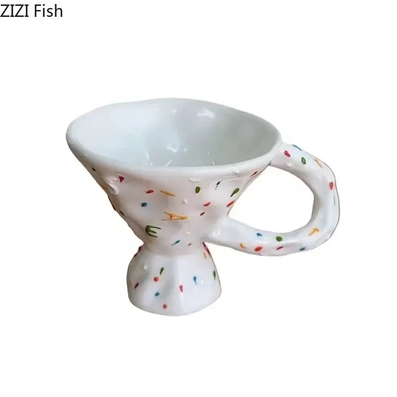 Abstract splatter decorative ceramic mug in white with textured surface and colorful confetti dots for dining room decorbites colorful icing