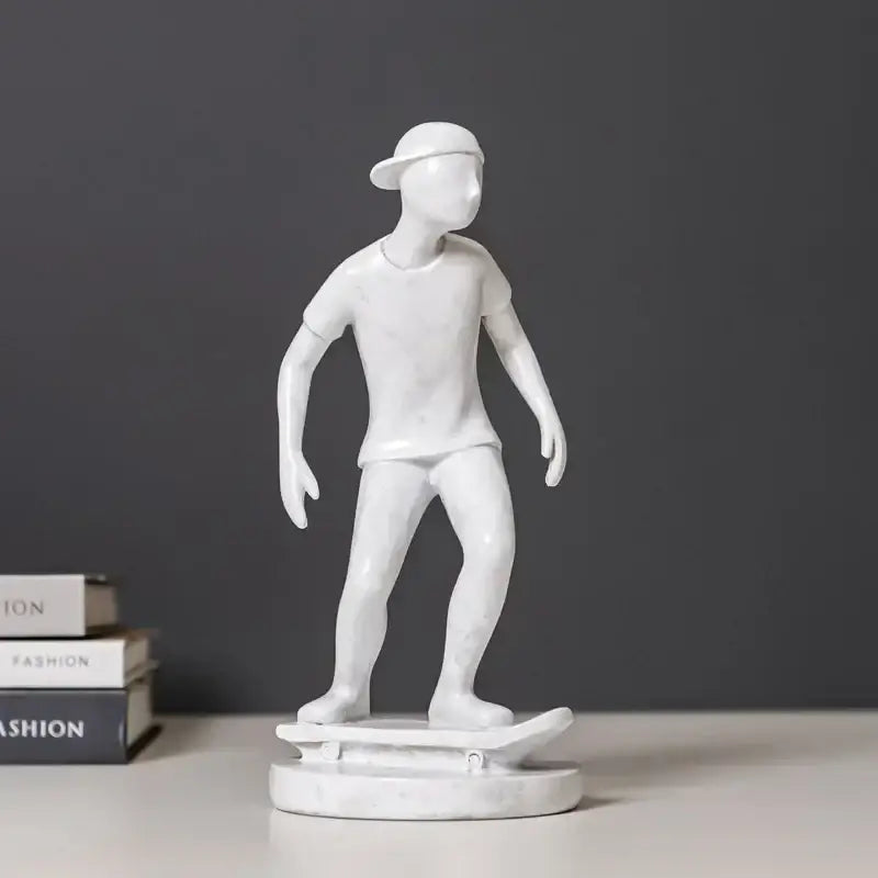White resin abstract sports player sculpture of skateboarder in cap and t-shirt on circular base for decorbites abstract sports