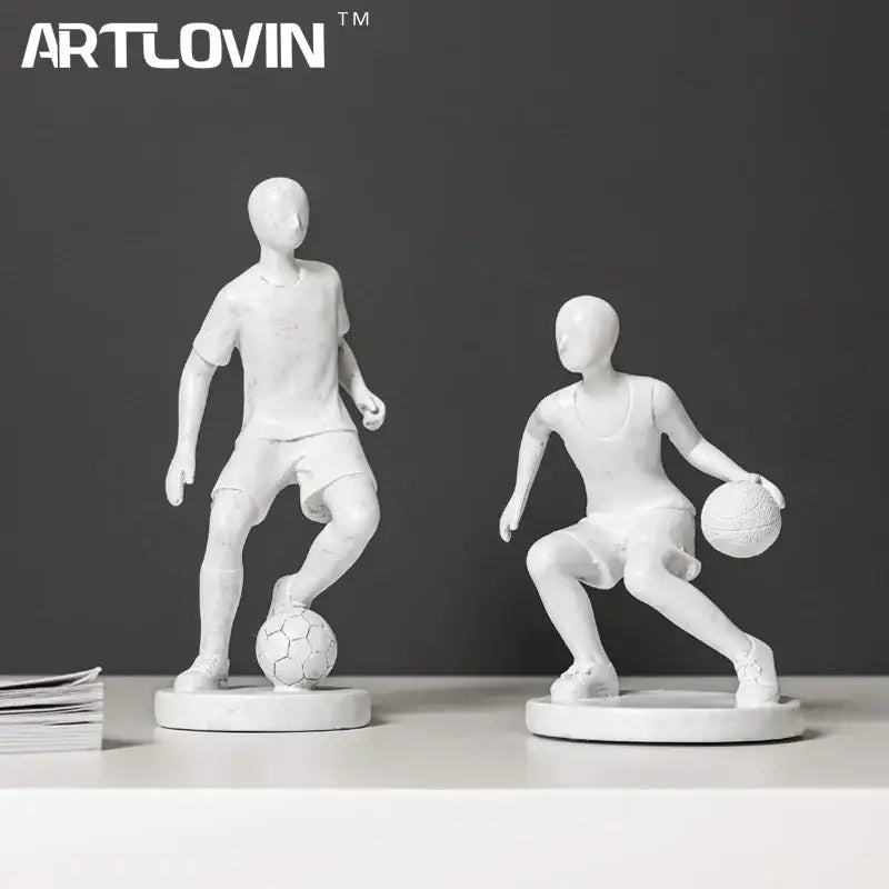 Two white resin abstract sports player sculptures featuring basketball dribbling and soccer kicking for living room decorbites abstract sports decor