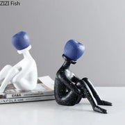 Abstract thinker resin black and white figurine with blue spherical heads crafted from glossy resin for living room decor