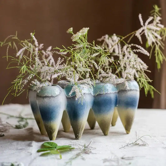 A set of five ceramic abstract tooth hanging vases with blue to green gradient glaze for living room decorbites decor