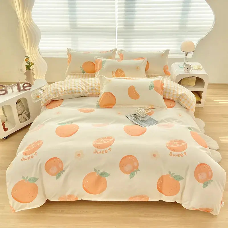 Cream-colored duvet cover featuring a decorbites cute pattern of orange fruits and sweet text in soft peach tones