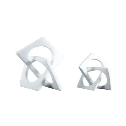 Abstract white ceramic geometric cross square ring bookends with interlocking design for living room decorbites geometric cross