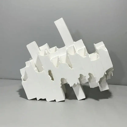 Abstract white decorbites geometric ceramics flower vase with jagged layered edges for modern living room decor