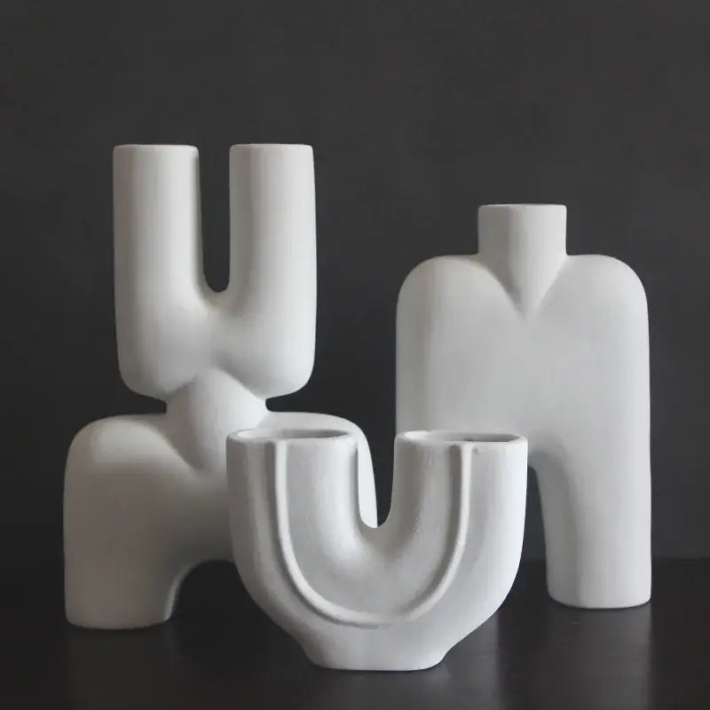 Abstract white geometric ceramic vase with minimalist organic shapes for living room decor by decorbites