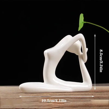 Abstract white porcelain yoga figure in a living room decor with a green leaf sprouting from its head by decorbites abstract yoga