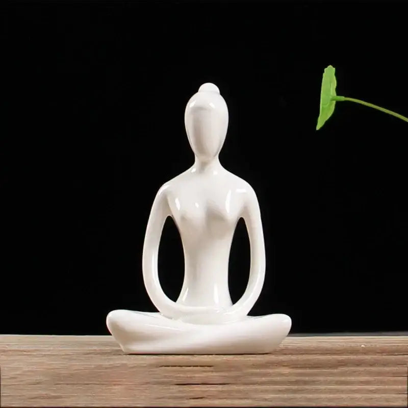 White ceramic abstract yoga figure figurine in meditative pose porcelain decorbites yoga figure for living room decor