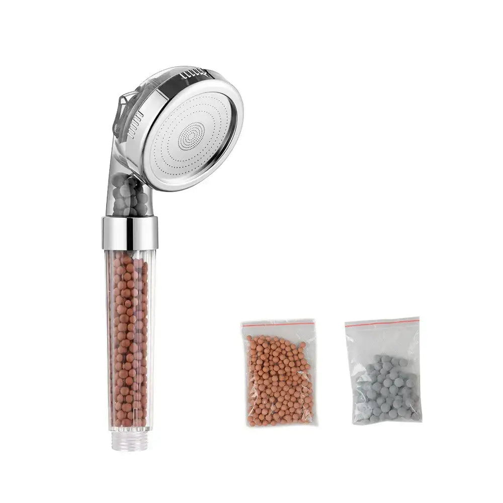 Adjustable high pressure chrome shower head with transparent body and brown filter beads for bathroom use