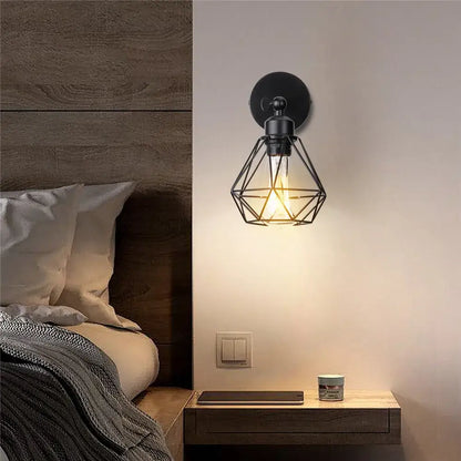 Black metal geometric cage wall light with exposed filament bulb decorbites adjustable industrial vintage design