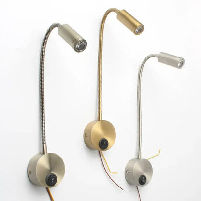Three adjustable led bedside wall sconces with flexible gooseneck arms in brushed brass and silver finishes for reading