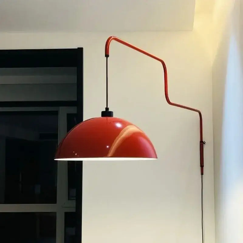 Vibrant red dome wall lamp with adjustable nordic pendant light and sleek curved metal arm for kitchen island use
