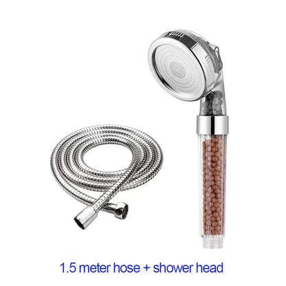Adjustable shower head with chrome accents, transparent body containing brown filter beads, and flexible chrome hose