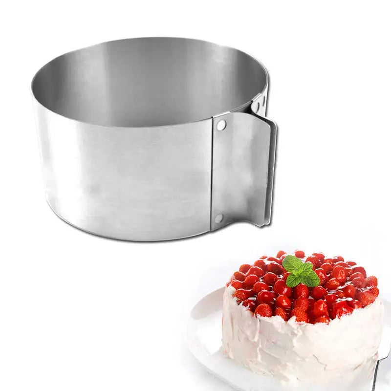 Silver stainless steel adjustable mousse ring round with hinged side for easy use as a cake slicer kitchen tool