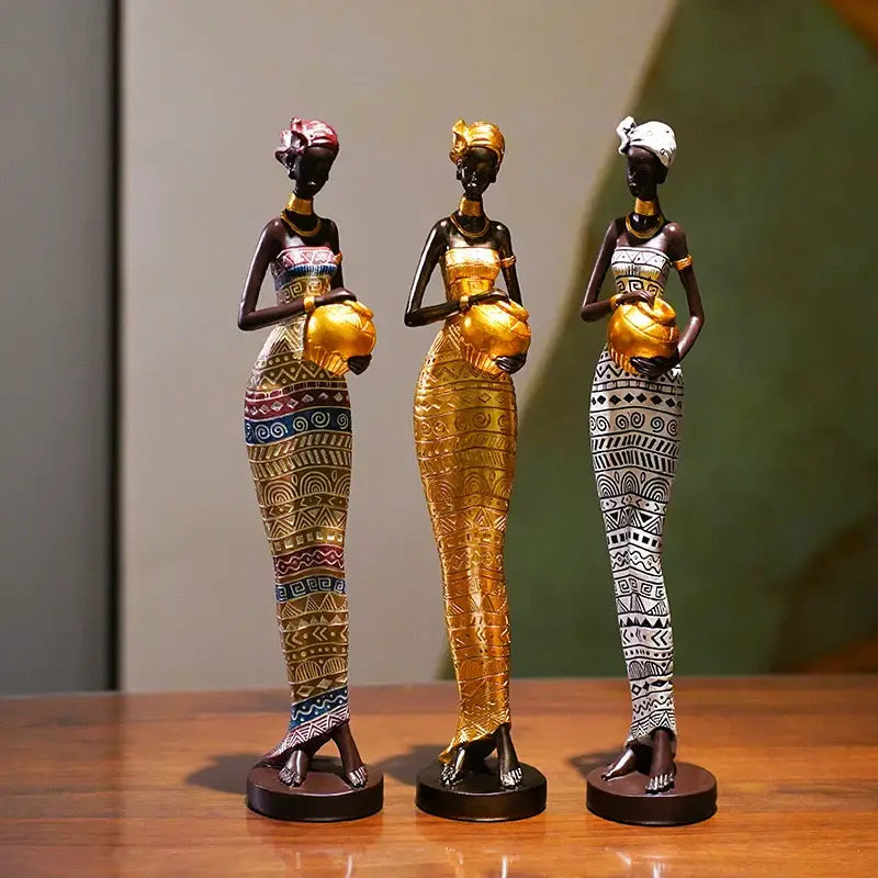 Three ornate african style black woman resin figurines with gold accents for living room decorbites decor