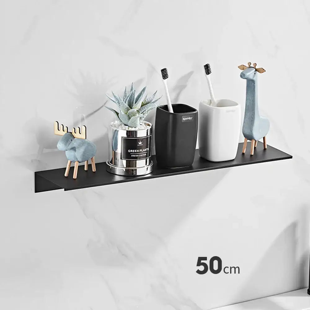 Black minimalist aluminum floating shelf from decorbites designed for bathroom and kitchen with nail free glue installation