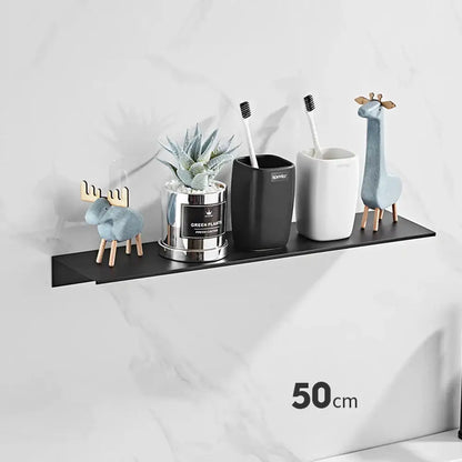 Black minimalist aluminum floating shelf from decorbites designed for bathroom and kitchen with nail free glue installation