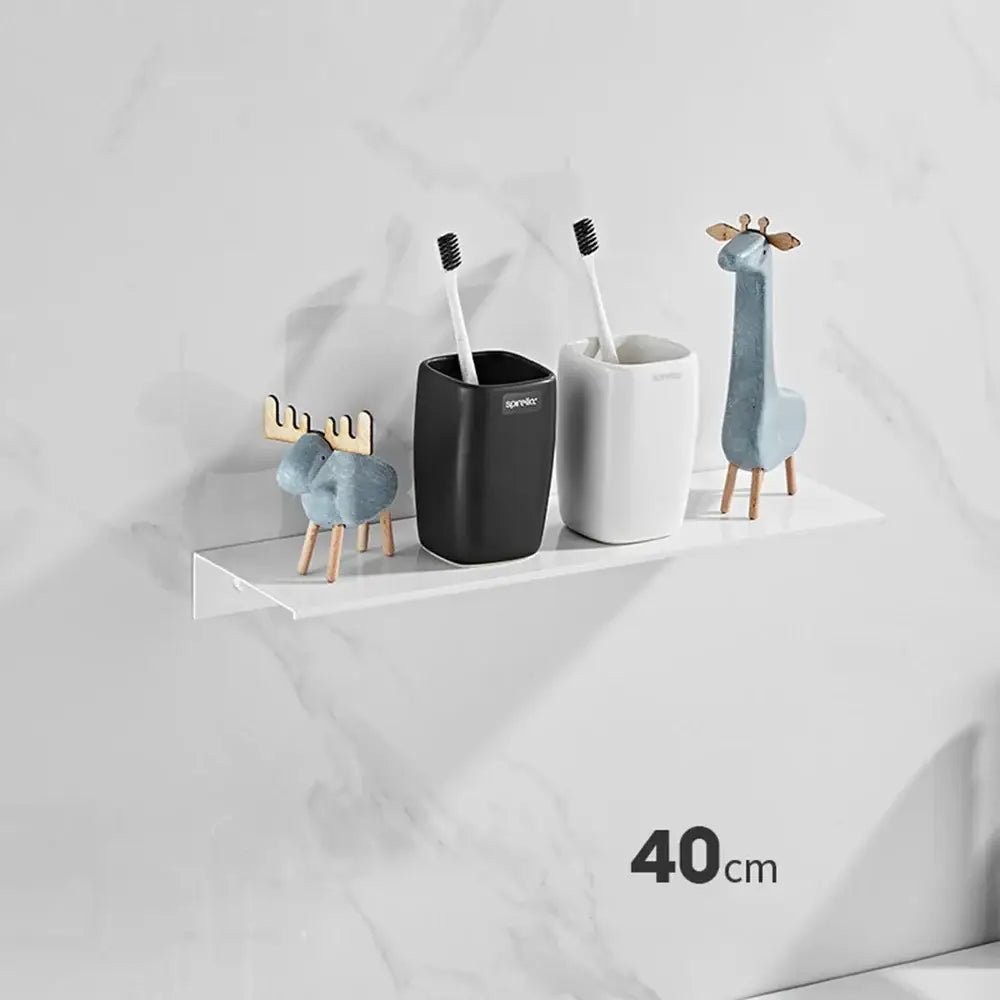 White minimalist aluminum floating shelves by decorbites for bathroom with nail free glue holding toothbrush holders and figurines