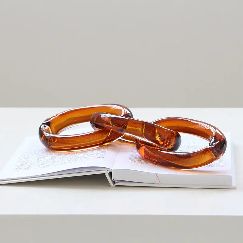 Translucent amber glass handcrafted chain buckles with smooth rounded links for living room decorbites decor