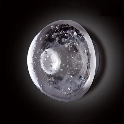 Amber and gold textured crystal led wall lamp with a translucent spherical glass orb featuring bubble decorbites crystal led