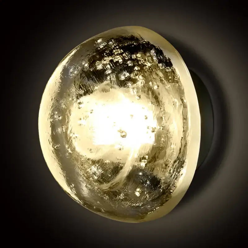 A warm amber and gold textured crystal led wall lamp with swirling patterns for bedroom decorbites crystal led decor