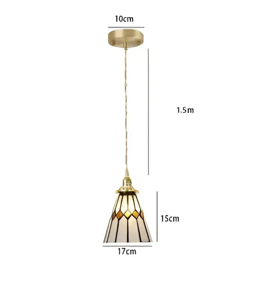 Gold-toned glass pendant light with amber and cream geometric stained glass shade for dining room lighting