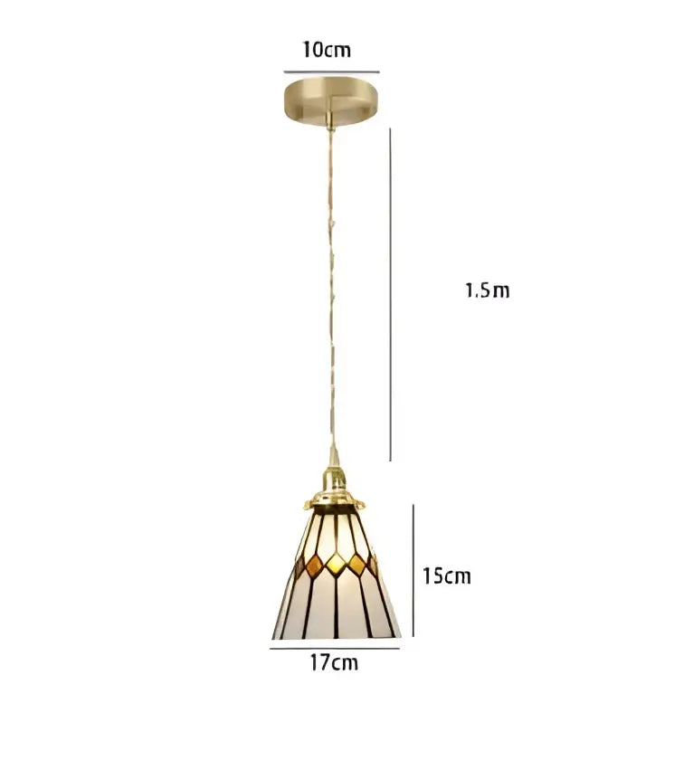 Gold-toned glass pendant light with amber and cream geometric stained glass shade for dining room lighting