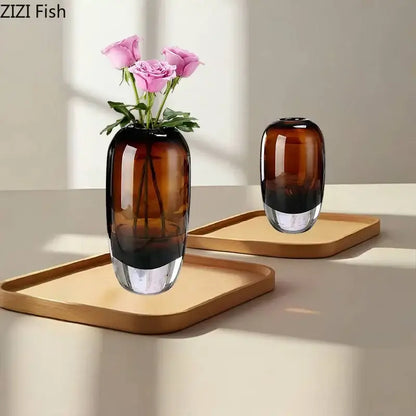 Brown gradient decorbites delicate glass vase with clear base holding pink roses for living room floral decor