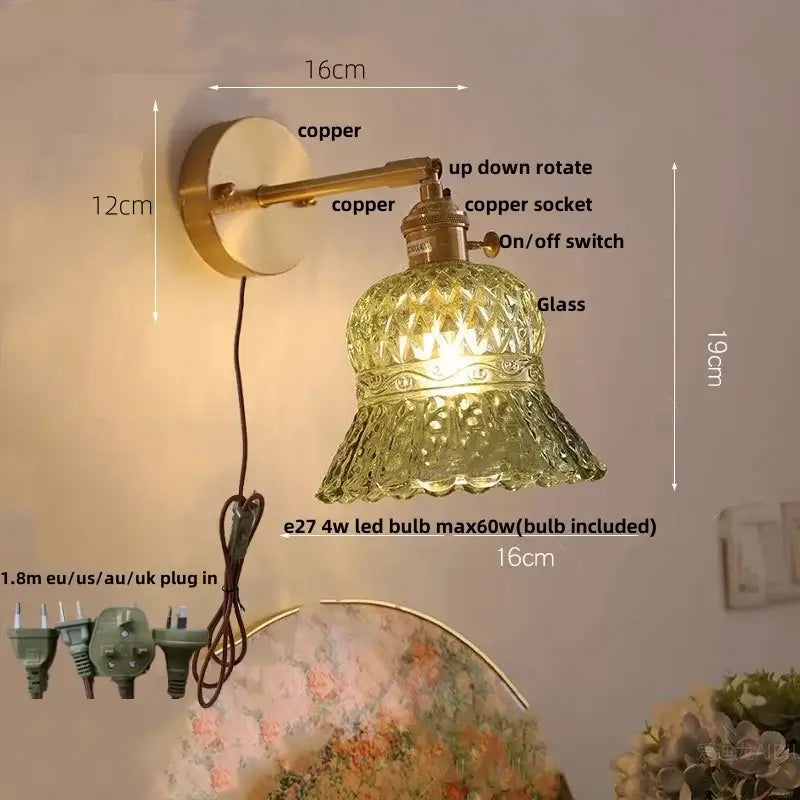 Antique-style copper wall light fixture with amber flower crystal glass shade and ornate rim for bedroom use