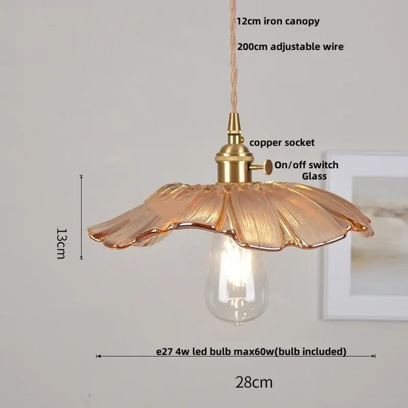 Amber flower glass pendant light with fluted petal design, translucent amber glass, and brass finish for dining room pendant lights