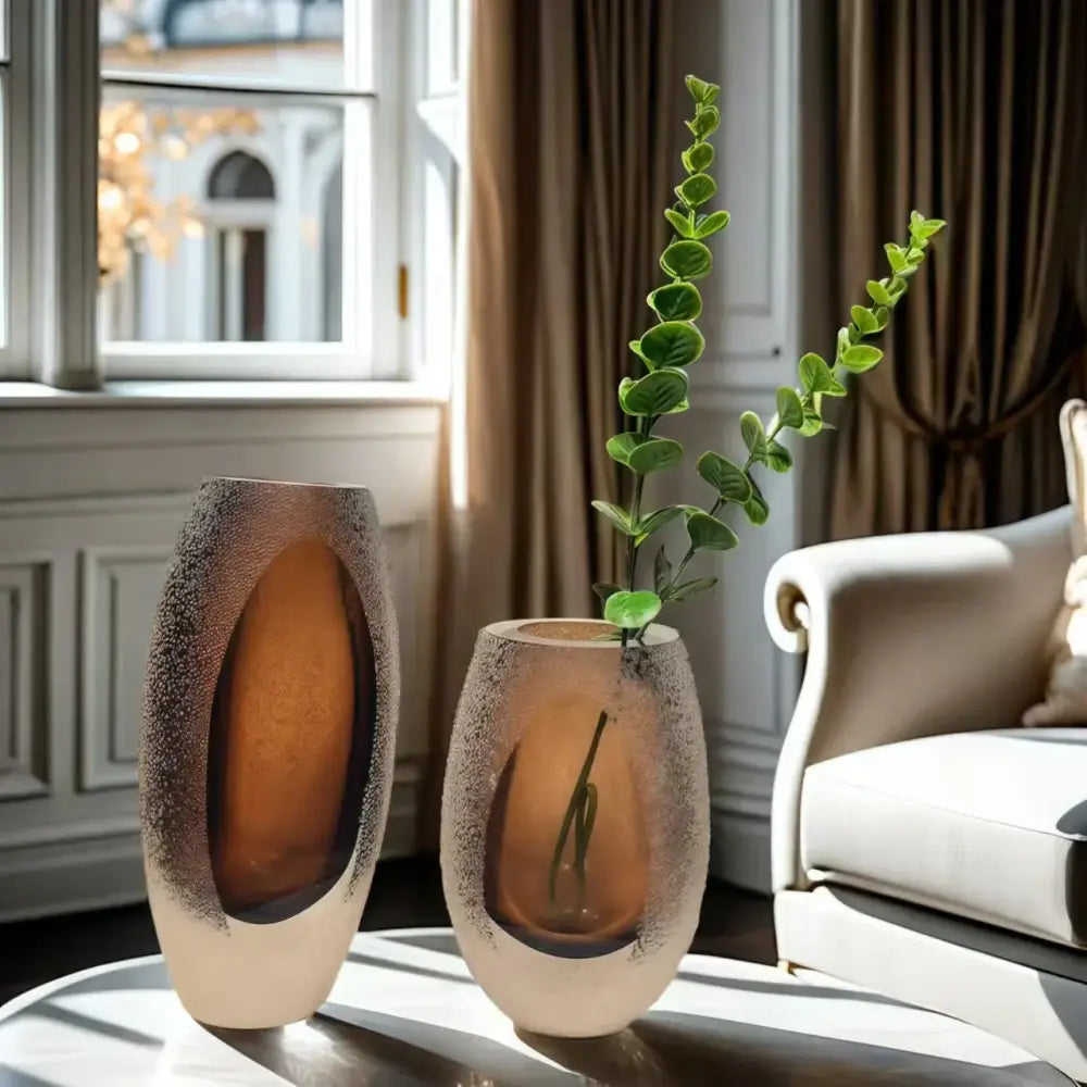 Two amber-toned decorbites frosted glass vases with textured finish and oval cutout perfect for living room decor