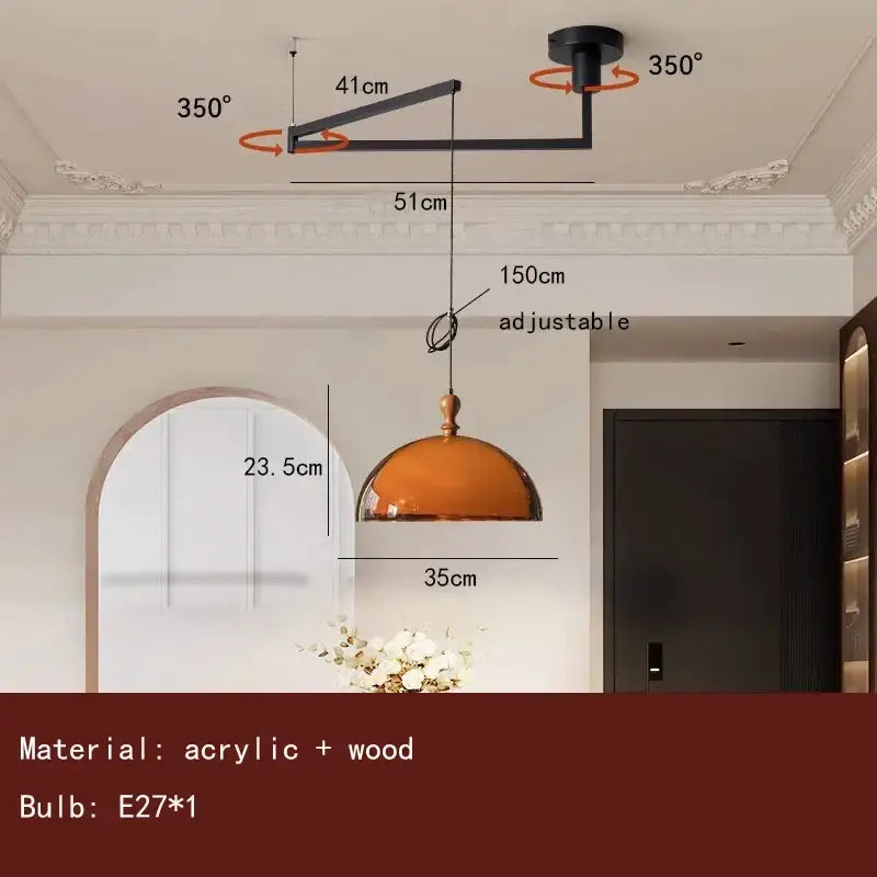 Adjustable modern pendant light with amber glass dome and dark wood accent for dining room lighting
