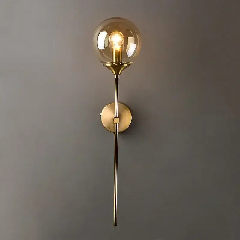 Brass finish glass ball sconce light with amber globe and exposed filament bulb for bedroom decorbites wall lamp