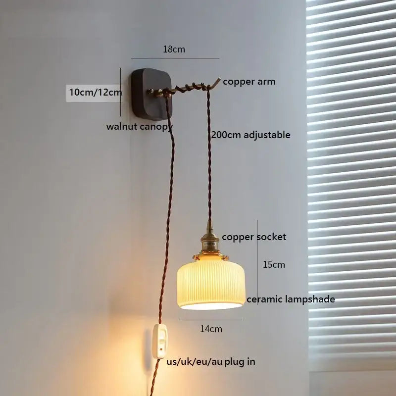 A warm-toned amber glass decorbites ceramic ball led wall light with vertical ridges and walnut canopy for bedroom decor