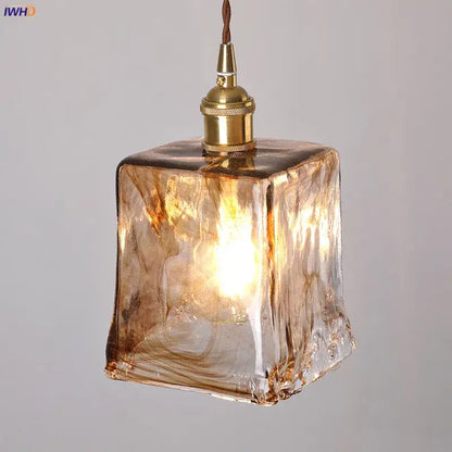 Amber-tinted textured glass copper pendant light with brass-finished socket for dining room copper pendant lights set