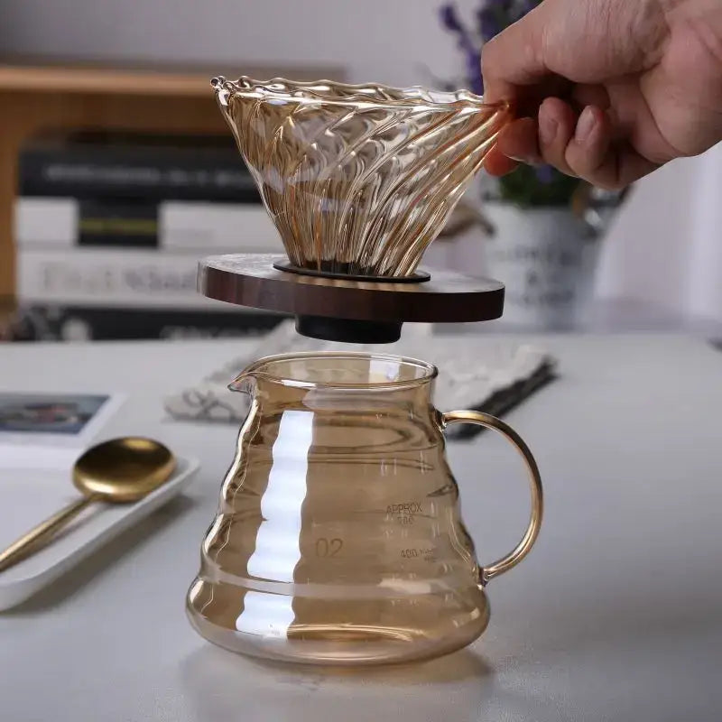 Amber glass fluted coffee filter pot with textured design and wooden base for pour over brewing coffee filter pot