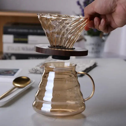 Amber glass fluted coffee filter pot with textured design and wooden base for pour over brewing coffee filter pot