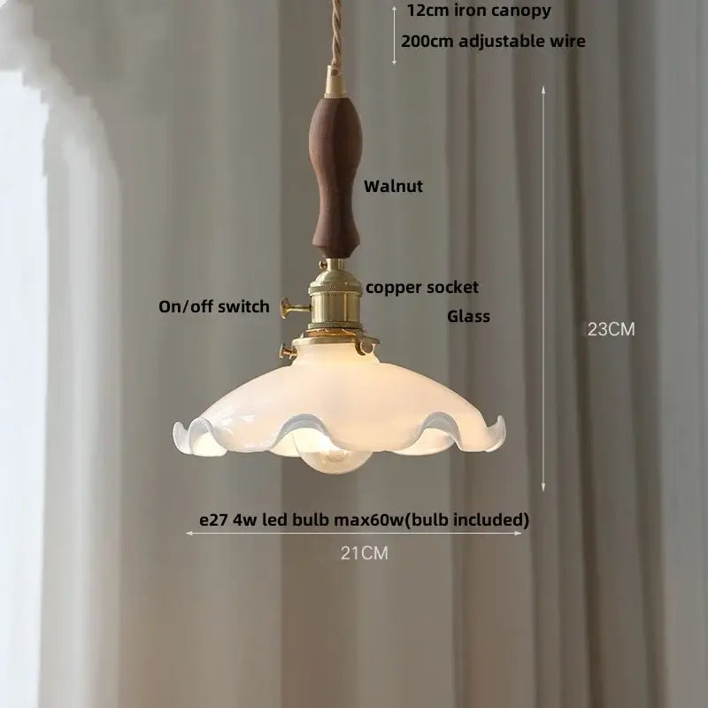 Amber glass pendant light with brass knob switch featuring a walnut handle and scalloped frosted glass shade for dining room decorbites brass knob