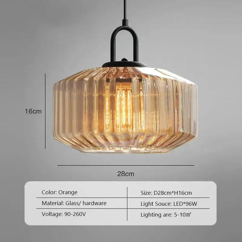 Orange glass led pendant chandelier with ribbed faceted design and black metal hardware for kitchen lighting