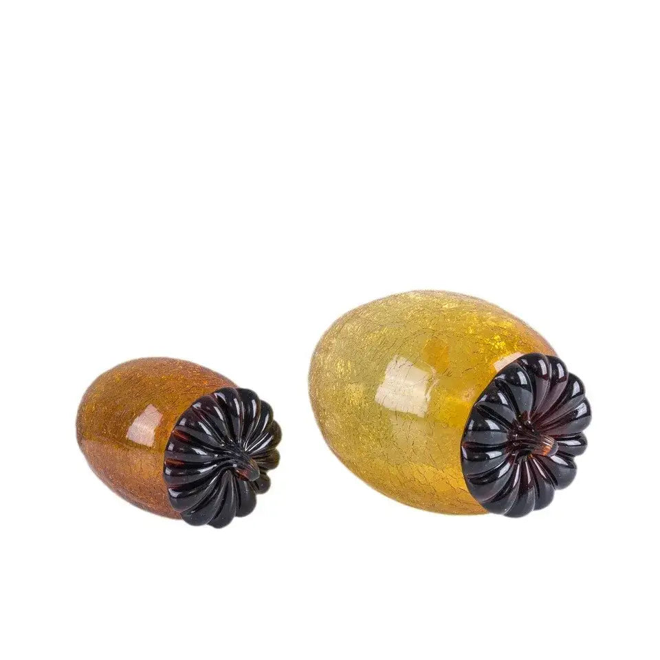 Two translucent amber and gold glass hazelnut pinecone decorbites glass hazelnut with dark ridged black caps for decor