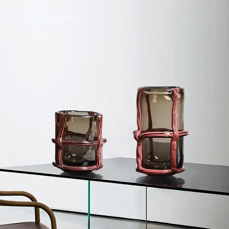 Two amber glass vases with sculpted reddish pink metallic bands for home decor by decorbites clear glass cross