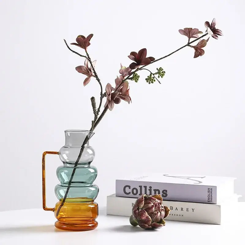 A layered amber and teal glass bubble ring vase with handle for living room decorbites glass bubble decor