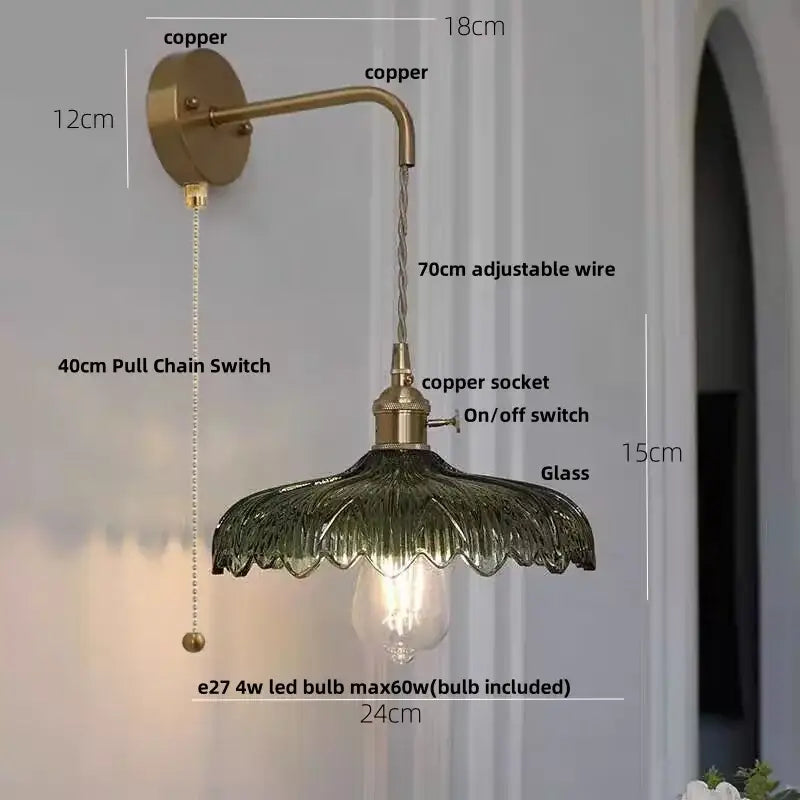 Amber vintage led wall light with copper sconce, dark green scalloped glass shade, and adjustable wire by decorbites